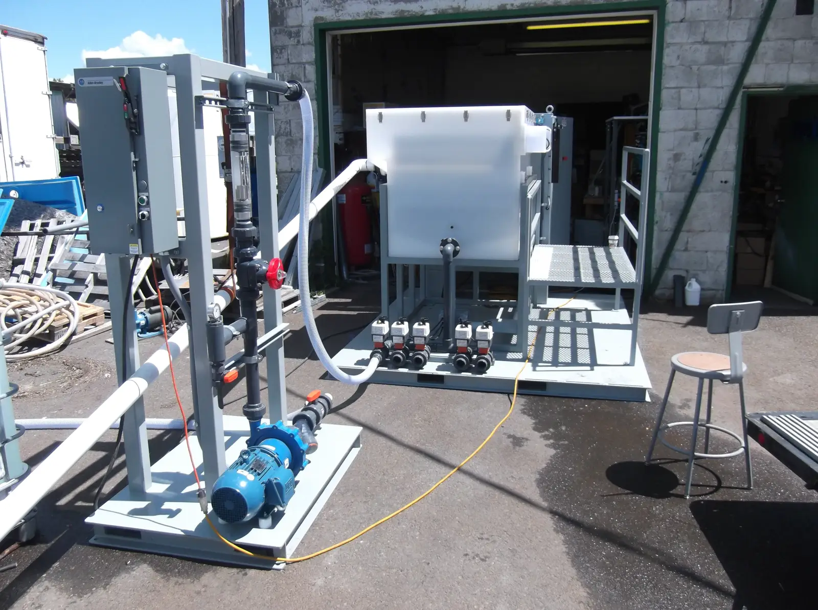 Containerized electrocoagulation field treatment system deployed on site